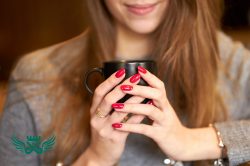 20230710172633 fpdl.in smiling girl with red nails holding cup coffee 133994 227 full 250x166 - 34 مدل کاشت ناخن پرطرفدار + 43 نمونه